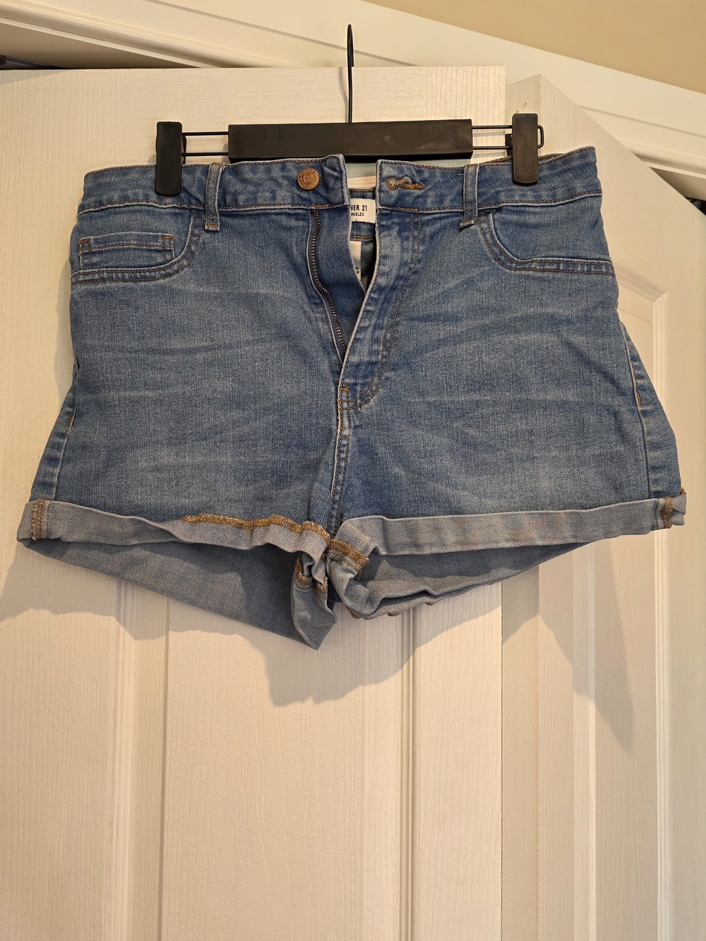 High-Rise Light Blue Denim Roll-Cuff Shorts